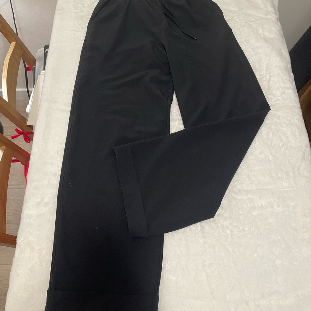 Wide Leg Pants, high waisteded, elasticic waist with drawstring and pockets.